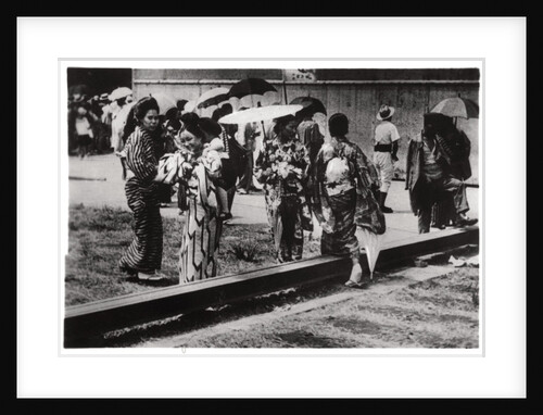 Japanese women by the Zeppelin hangar, Kasumigaura, Japan by Anonymous