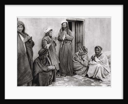 A mullah teaching a prayer to a young man, Iraq by A Kerim