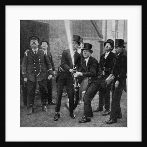 Eton's amateur firemen practising a hose drill, Berkshire by Anonymous