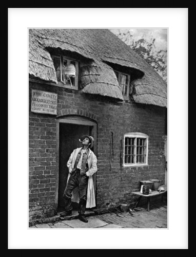 A man smoking a pipe outside a shop, Worcestershire by AW Cutler