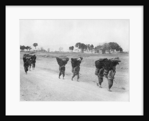 Charcoal bearers on the road to Peking, China by Anonymous