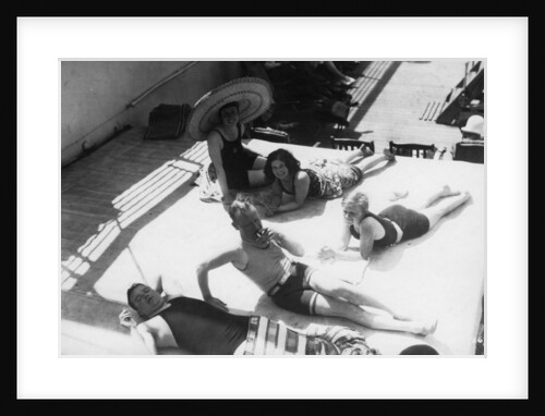 Passengers sunbathing on board a cruise ship by Anonymous