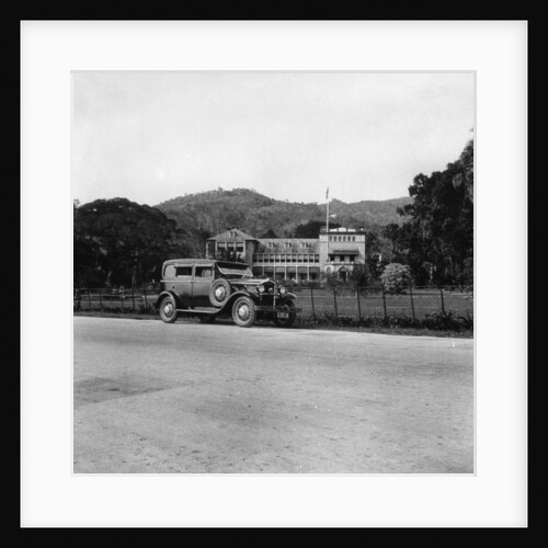 A Singer car in front of the Governor's house, Trinidad, Trinidad and Tobago by Anonymous