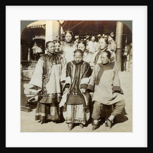 A group of women in the courtyard of a wealthy Chinese house, Peking, China by Underwood & Underwood