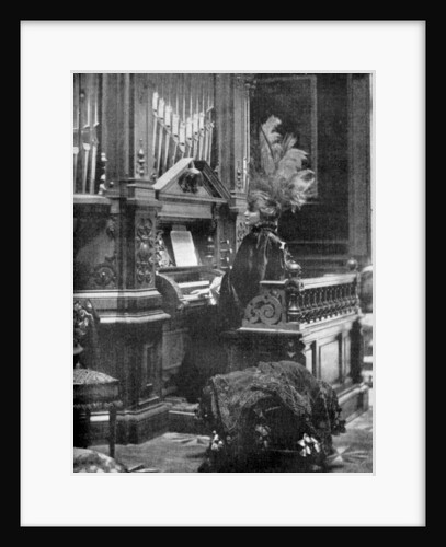 The Queen of Romania playing the organ by Anonymous