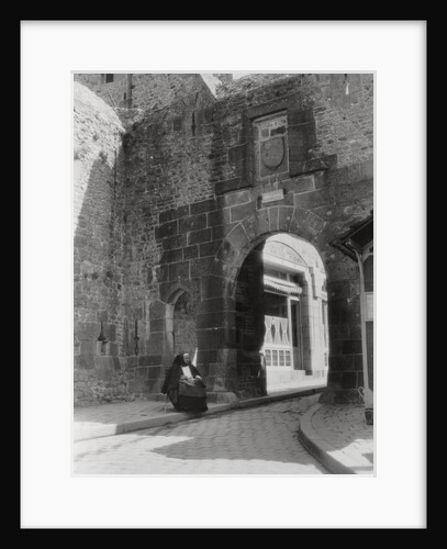 Gateway and entrance to the only street of Mont St Michel, Normandy, France by Anonymous