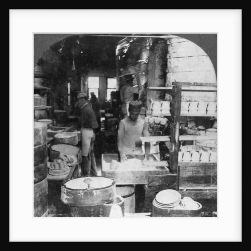 Firing tableware in the Noted Pottery Centre, Trenton, New Jersey, USA by Keystone View Company