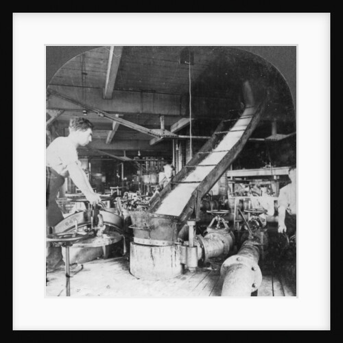 Sugar beet pulp and juice flowing from tank to tank, Montreal, Canada by Keystone View Company