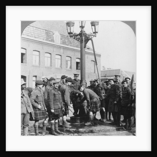Soldiers filling their water bottles at the town pump La Gorgue, France, World War I by Realistic Travels Publishers