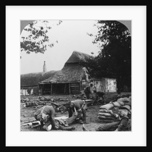 Stretcher bearers caring for wounded at an improvised first aid post, World War I by Realistic Travels Publishers