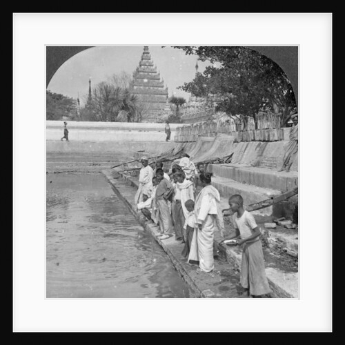 Pilgrims feeding holy turtles, Arakan Pagoda, Mandalay, Burma by Stereo Travel Co
