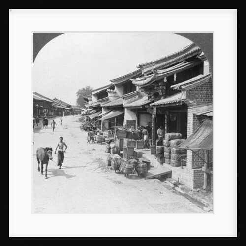 Main business street of the Chinese quarter, Bhamo, Burma by Stereo Travel Co