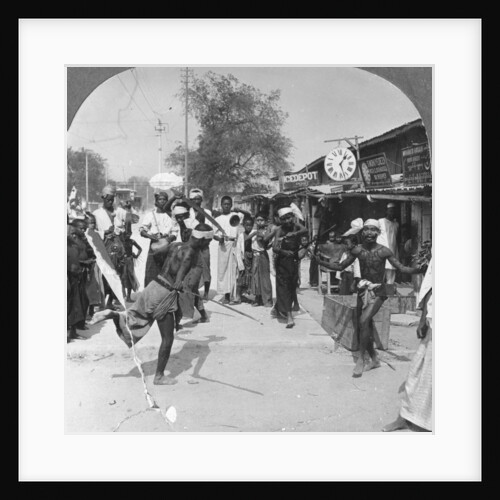 Young men performing a sword dance, Burma by Stereo Travel Co
