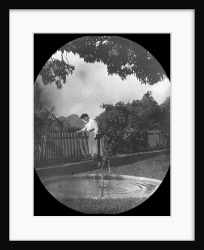 Woman by a pond in a garden, Rio de Janeiro, Brazil by Anonymous