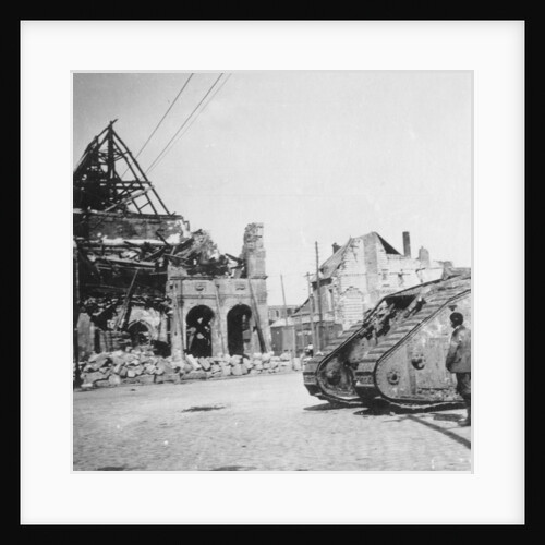 British tank in front of ruined buildings, Peronne, France, World War I by Nightingale & Co