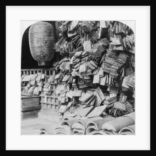 A bundle of buddhist prayers, China by Underwood & Underwood