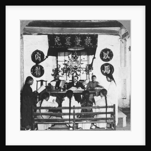 Interior of a schoolroom at Peking University, China by CH Graves