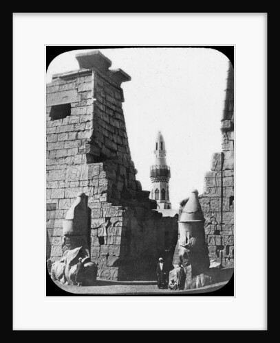 Minaret and ruins of Luxor Temple, Luxor, Egypt, c1890. Lantern slide by Newton & Co