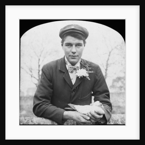 E Hack holding a pigeon by Anonymous