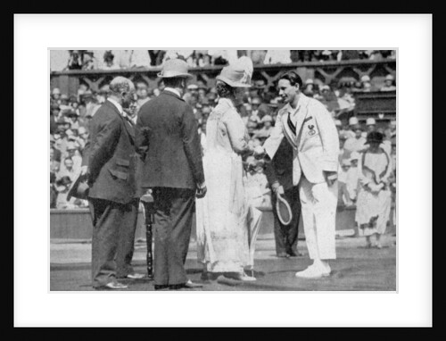 Jean Borotra receives his medal from Queen Mary on centre court by London News Agency