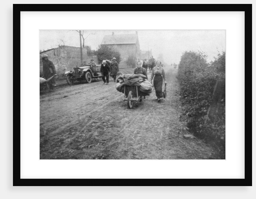 A British soldier helping a woman return to her village, France by Anonymous