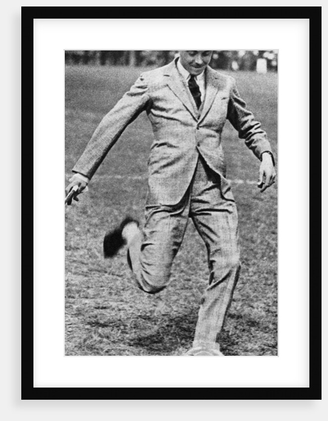 The Prince of Wales kicking off the Spurs versus Fulham football match by Anonymous
