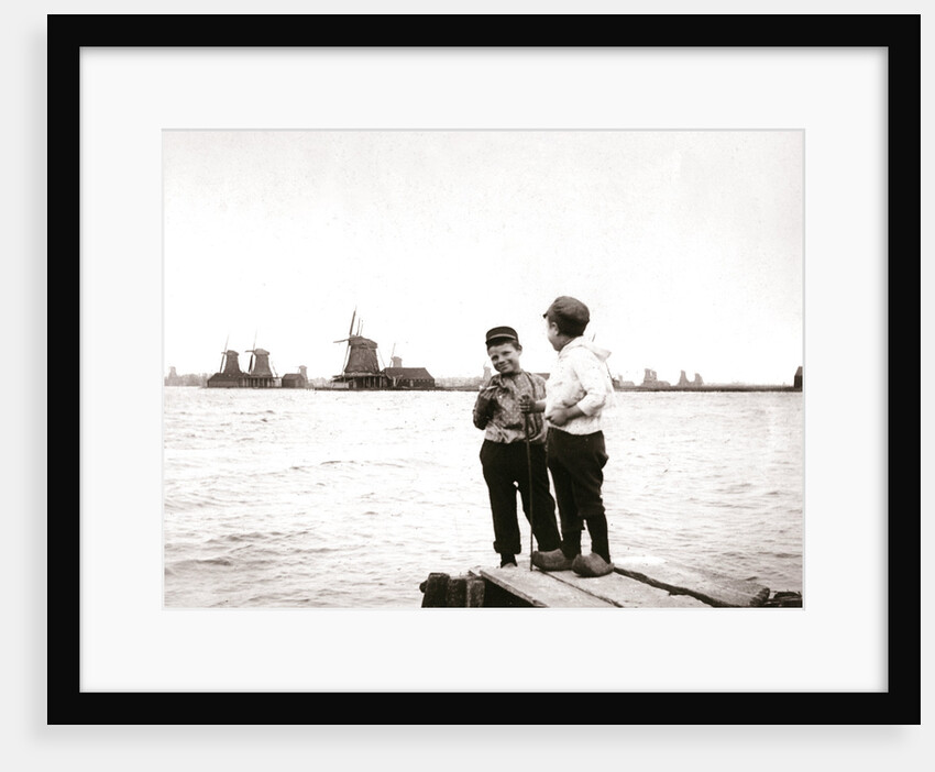Boys by a canal, Laandam, Netherlands by James Batkin