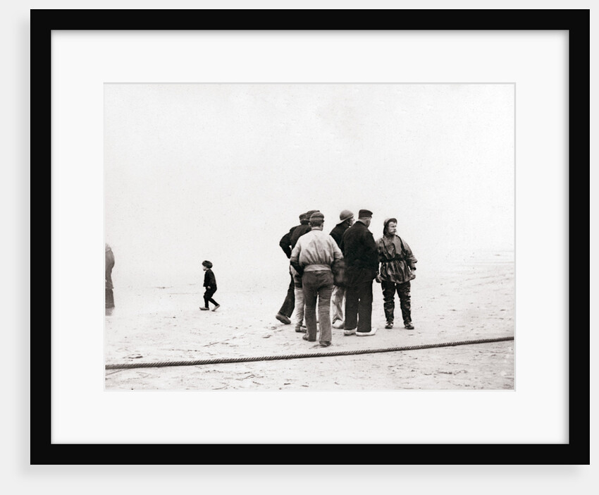 Men on the shore, Scheveningen, Netherlands by James Batkin