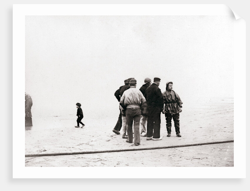 Men on the shore, Scheveningen, Netherlands by James Batkin