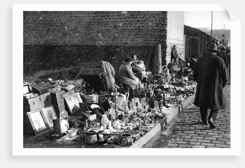 A display of goods at the flea market, Paris by Ernest Flammarion