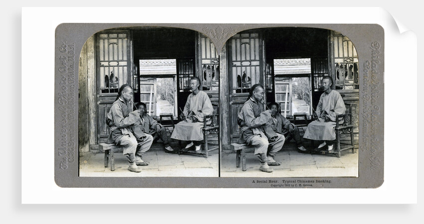 A social hour, a typical Chinaman smoking, China by CH Graves