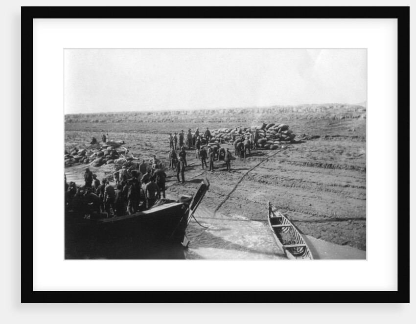 British troops unloading dates on the shore of the Tigris river by Anonymous