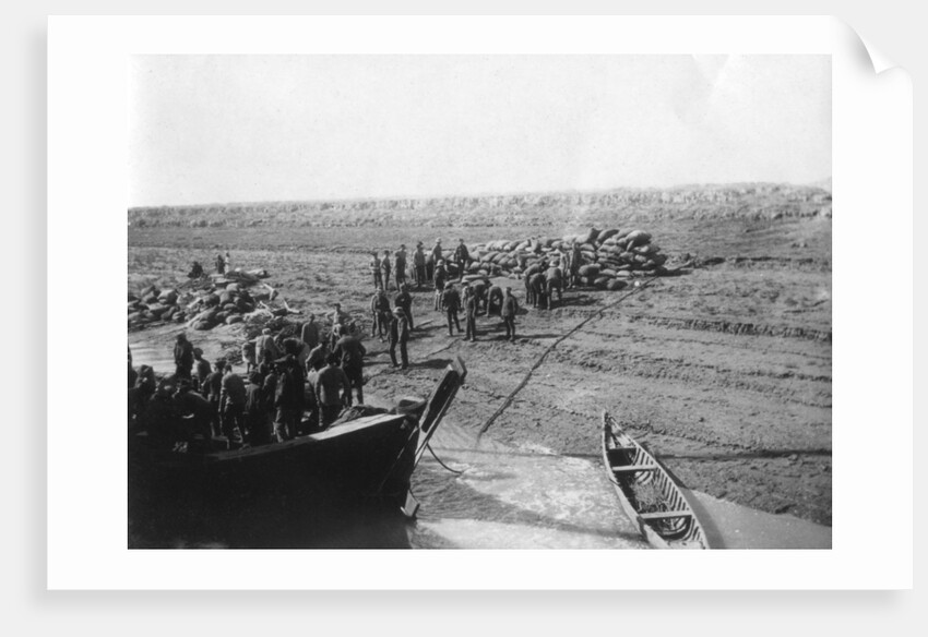 British troops unloading dates on the shore of the Tigris river by Anonymous