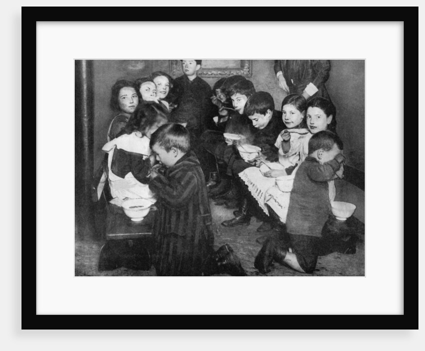 Children in a communal kitchen, London by Anonymous