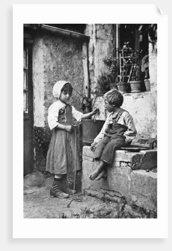 Two children in a backyard by Constance Ellis