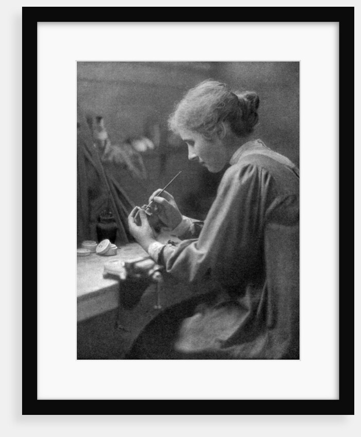 A craftswoman at work by ET Holding