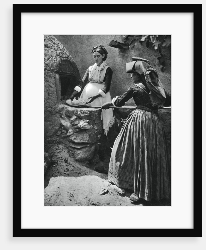 Women at the oven, Sardinia, Italy by Martin Hurlimann