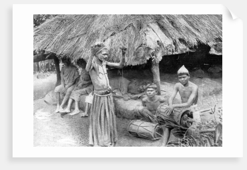 A sorcerer ejecting a spirit from a sick man in South India by Anonymous