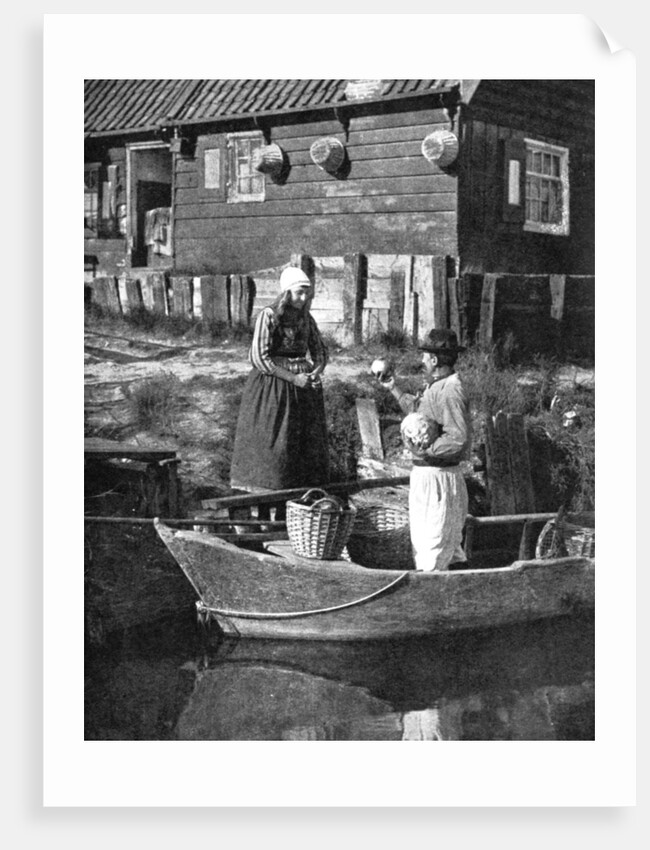 Greengrocer bringing goods by boat, Marken, Holland by Donald McLeish
