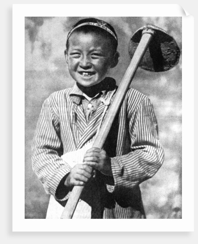 Uzbek schoolboy working on a farm by Anonymous