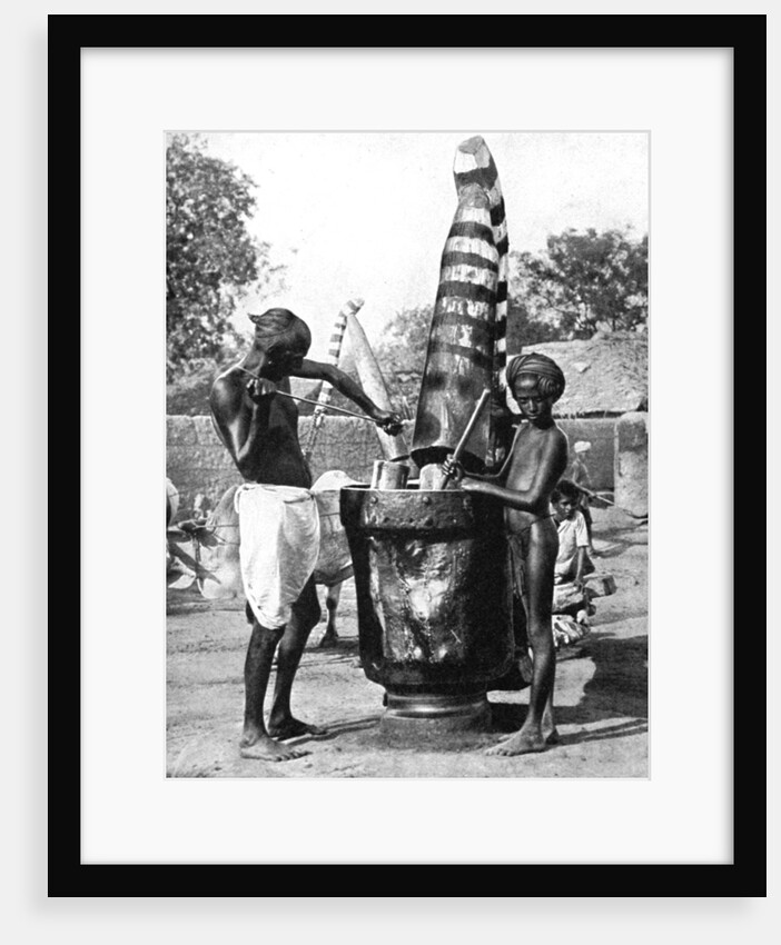 Sesame mill painted in honour of a Hindu goddess, India by Ewing Galloway