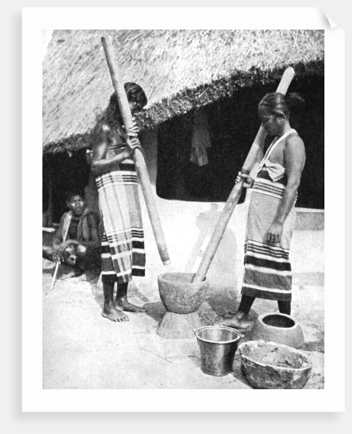 Newar women pounding grain, Nepal by Ewing Galloway