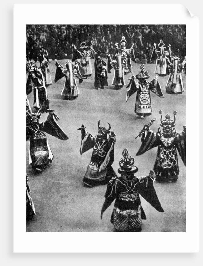 Masked dancers, Tibet by Ewing Galloway