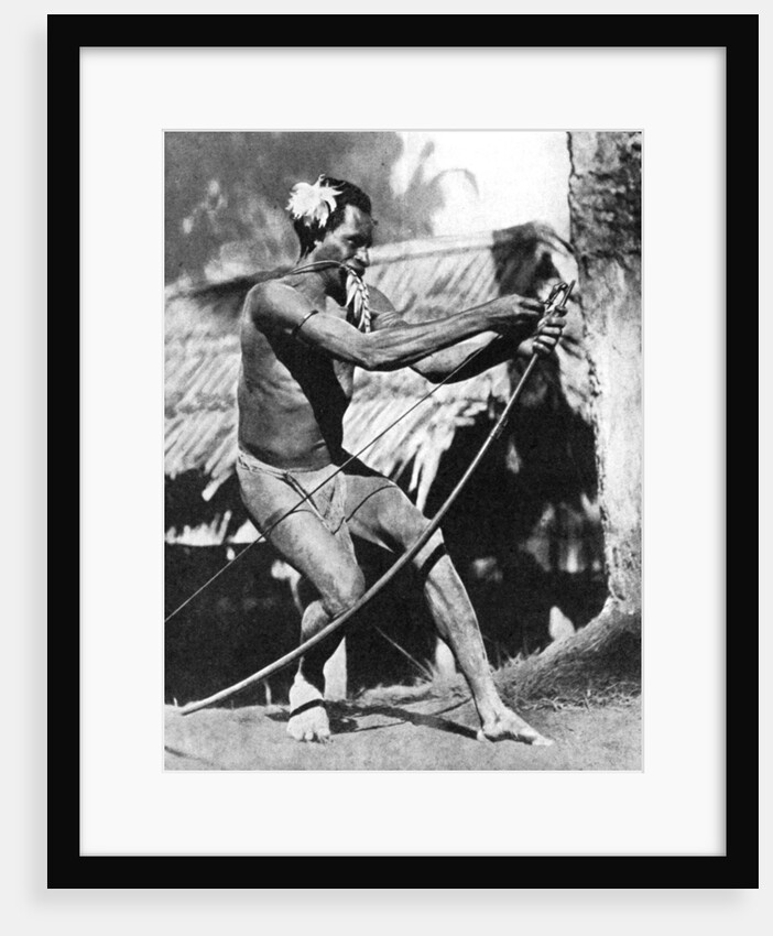 A huntsman stringing his bow by Wide World Photos