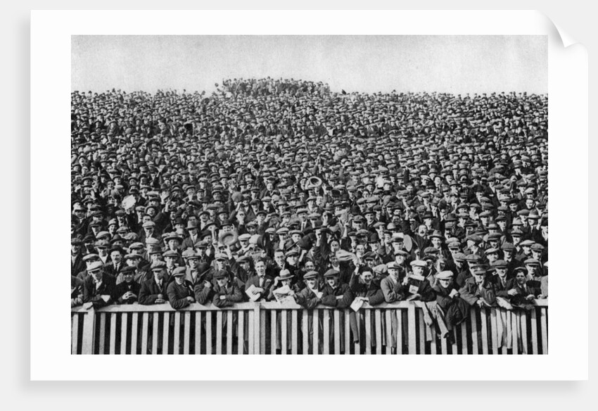 A Saturday winter football crowd, London by Anonymous