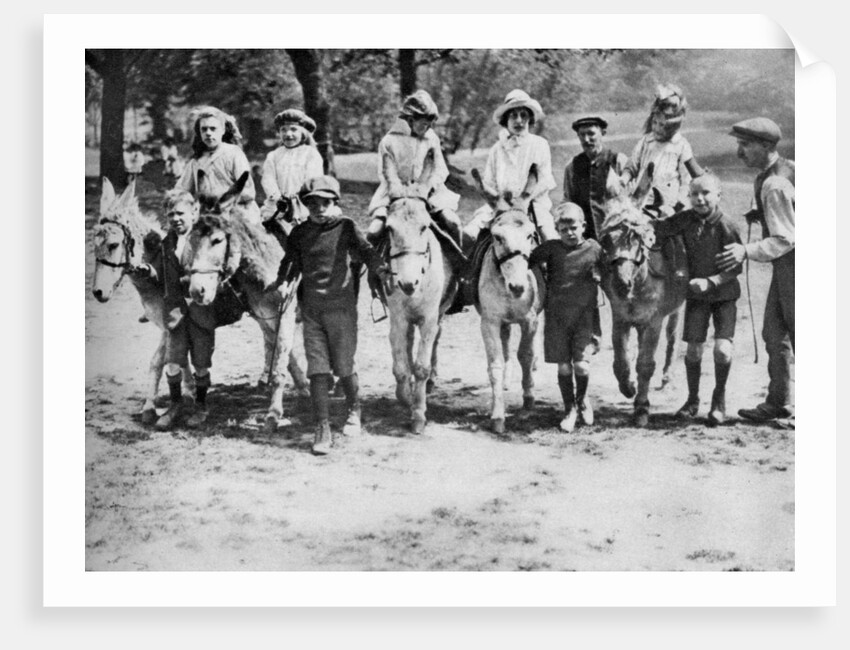 A donkey ride on a bank holiday on Hamstead Heath, London by Anonymous