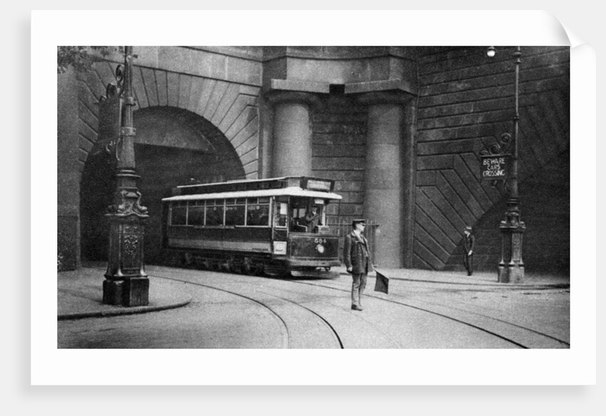 A tram running beneath Kingsway, Aldwych and Somerset House, London by Anonymous