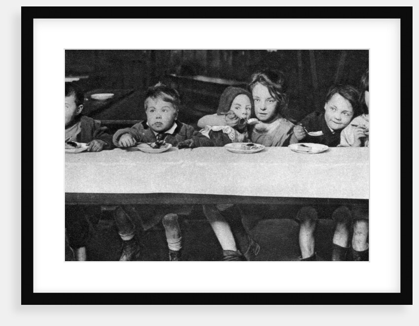 East End children being fed by a charitable organisation, London by Anonymous