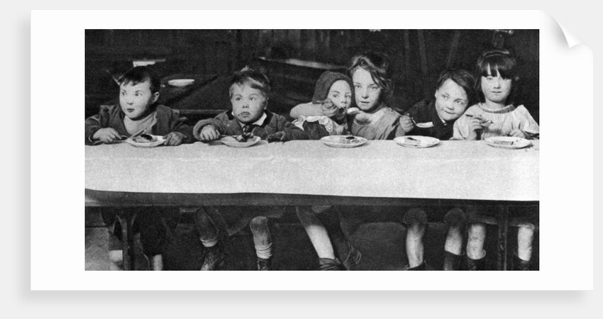 East End children being fed by a charitable organisation, London by Anonymous