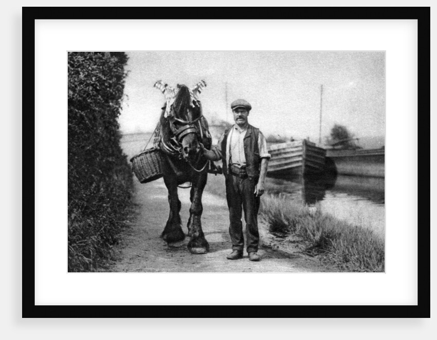 A horse pulling a canal barge by Anonymous